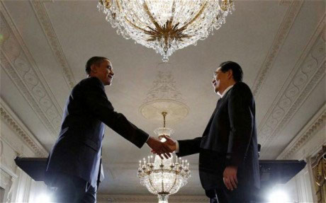 Ông Obama chào đón lãnh đạo Trung Quốc. Ảnh: AP