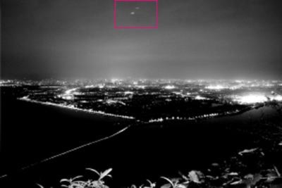 Bức ảnh có hai UFO của Dong Rong. Ảnh: People Daily.