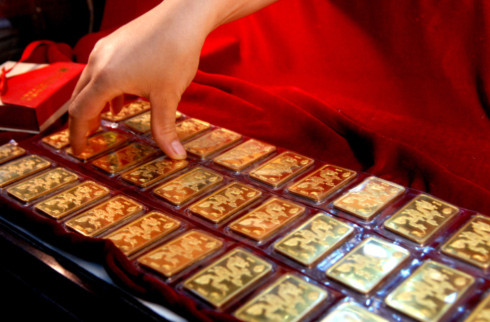 Việc kinh doanh vàng miếng sẽ bị quản lý chặt hơn trong năm 2011. Ảnh minh họa: Hoàng Hà