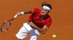 Federer, Wozniacki lọt vào vòng ba Roland Garros