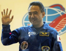 Satoshi Furukawa trong cuộc họp báo hôm qua, trước khi xuất phát từ snâ bay vũ trụ Baikonur. Ảnh: AP