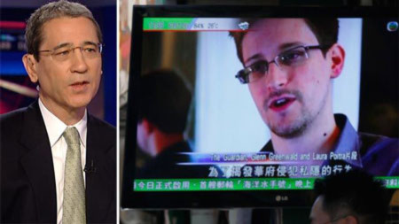 Nhà phân tích Chang (trái) cho rằng nhiều khả năng Snowden (phải) là gián điệp cho Trung Quốc.
