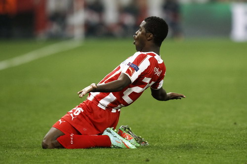 Olympiakos' Campbell celebrates after scoring against Manchester United during their Champions League round of 16 first leg soccer match in Piraeus