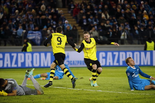 Borussia Dortmund's Lewandowski and Piszczek celebrate a goal against Zenit St Petersburg during their Champions League soccer match in St. Petersburg