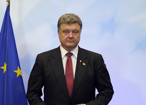 Ukrainian President Poroshenko arrives for a news conference at the European Council headquarters during an EU summit in Brussels
