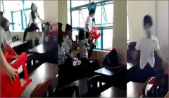 Nữ sinh lớp 7/5, trường THCS Lý Tự Trọng (TP Trà Vinh, tỉnh Trà Vinh) bị 7 bạn đánh hội đồng - Ảnh cắt từ clip