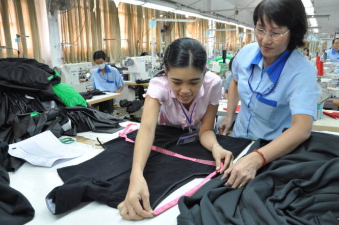 Sản xuất hàng dệt may xuất khẩu vào thị trường châu Âu tại Công ty CP Garmex Sài Gòn - Ảnh: Trần Vũ Nghi