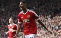 Manchester United's Marcus Rashford, runs to celebrate with teammates after scoring his sides second goal of the game during the English Premier League soccer match between Manchester United and Arsenal at Old Trafford Stadium, Manchester, England, Sunday, Feb. 28, 2016. (AP Photo/Jon Super)