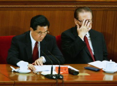 BEIJING - SEPTEMBER 03: Chinese President, Hu Jintao, (L) and former President, Jiang Zemin, attend a meeting marking the 60th anniversary of the victory of China's Resistance War Against Japanese Aggression September 3, 2005 in Beijing, China. (Photo by Andrew Wong/Getty Images)