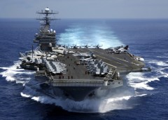 050315-N-3241H-001
The nuclear powered aircraft carrier USS Carl Vinson (CVN 70) plows through the Indian Ocean as aircraft on its flight deck are prepared for flight operations on March 15, 2005. The Carl Vinson Strike Group is en route to the Persian Gulf to support for Operation Iraqi Freedom. DoD photo by Petty Officer 3rd Class Dusty Howell, U.S. Navy. (Released)