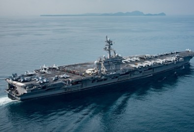 The U.S. aircraft carrier USS Carl Vinson transits the Sunda Strait, Indonesia on April 15, 2017. Picture taken on April 15, 2017. Sean M. Castellano/Courtesy U.S. Navy/Handout via REUTERS ATTENTION EDITORS - THIS IMAGE WAS PROVIDED BY A THIRD PARTY. EDITORIAL USE ONLY.