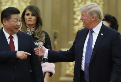 Tổng thống Mỹ Donald Trump và Lãnh đạo Trung Quốc Tập Cận Bình đến dạ tiệc tại Đại Lễ đường Nhân dân ở Bắc Kinh, 9/11/2017.(Thomas Peter-Pool/Getty Images)