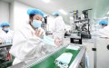 Một dây chuyền sản xuất khẩu trang y tế tại công ty ở Đường Sơn, Hà Bắc, Trung Quốc. Ảnh: Xinhua